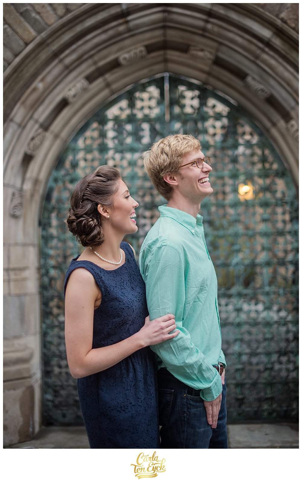 An engagement session in front of a gorgeous gate on the campus of Yale in New Haven CT