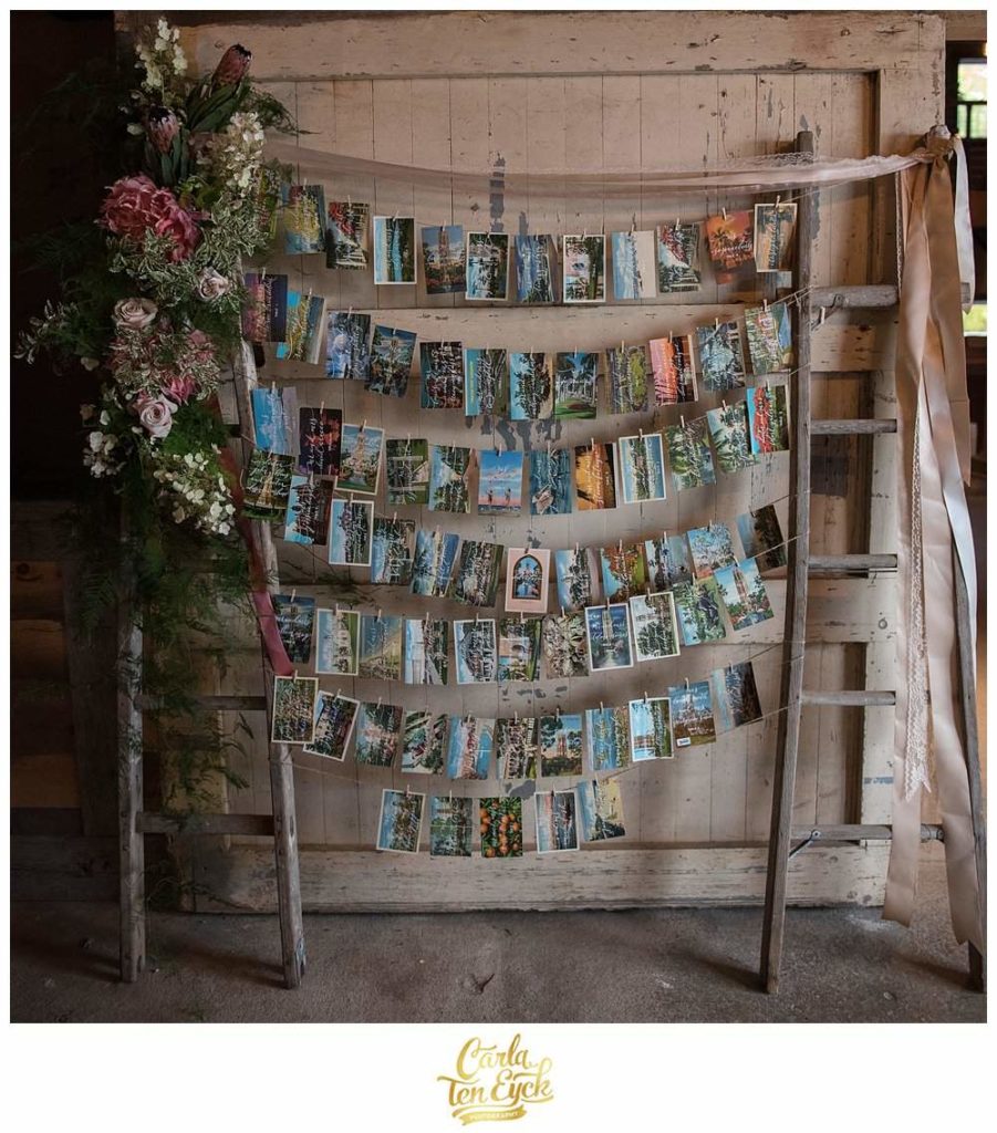 Seating card display at a wedding in the barn at South Farms in Morris CT