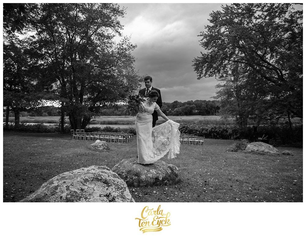 A bride and groom on the property of the Bee and Thistle Inn in Old Lyme CT