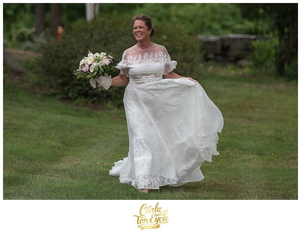 Bride in Rivini wedding gown with romantic wedding bouquet by Carrie Wilcox Floral at Harkness Park, Waterford CT