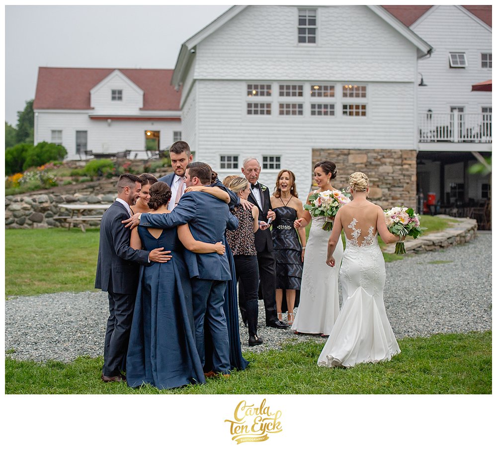 Wedding party in navy blue at Jonathan Edwards Winery