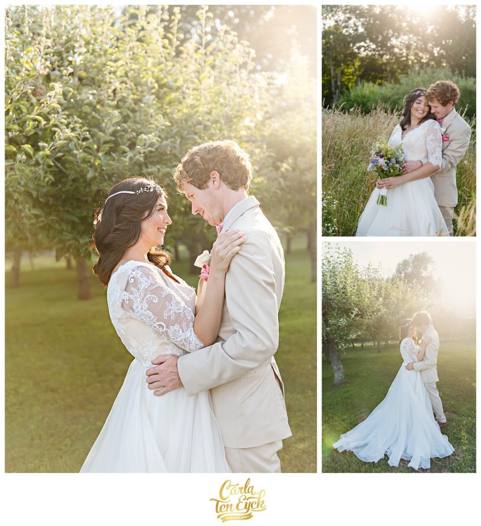 A bride and groom kiss on their wedding day in an orchard at sunset at Smith Farm Farm in East Haddam CT