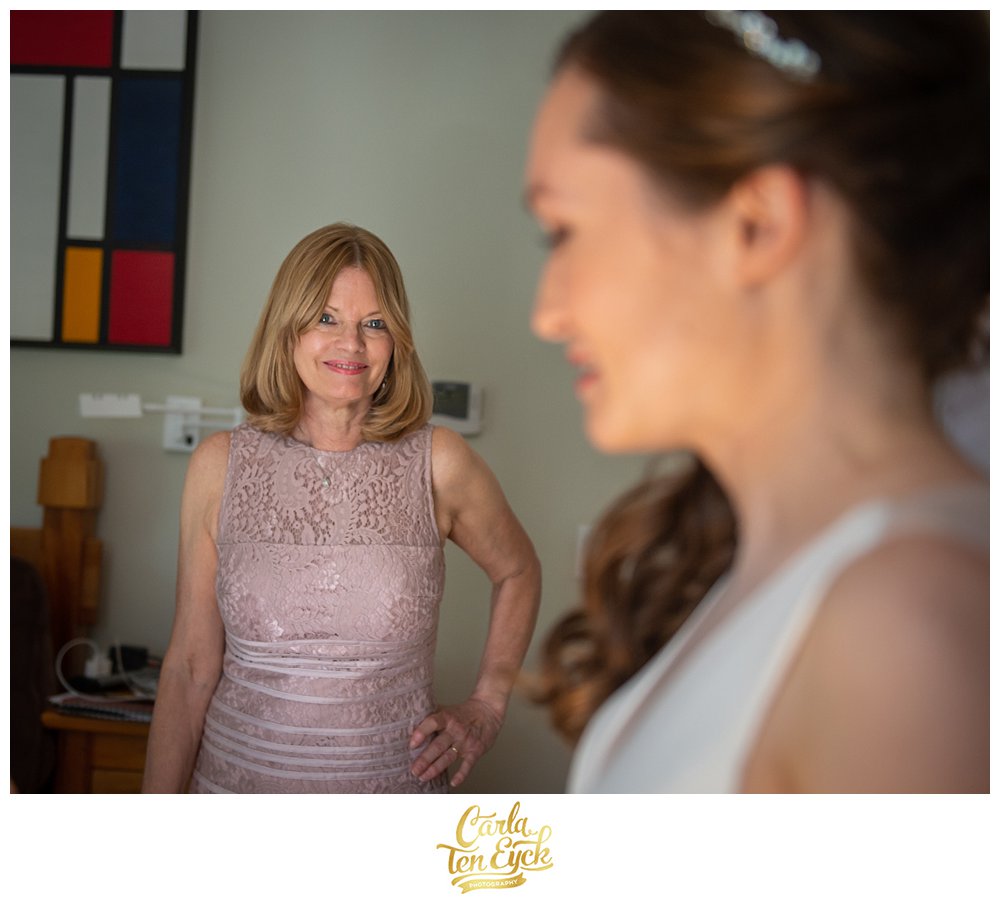 Mother of the bride looking at her daughter on her wedding day in Norwalk CT