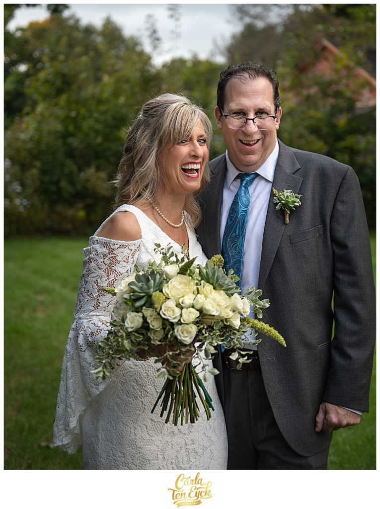 Emily's Catering owner Rick Kerzner laughs with his bride Jodi on their wedding day in Cheshire CT
