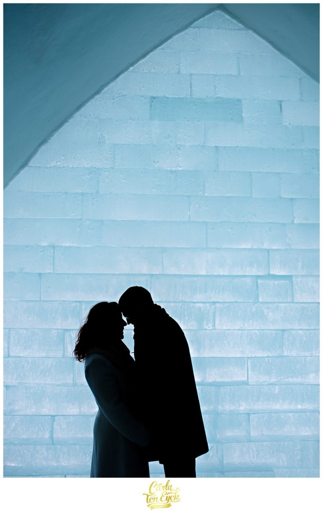 Couple embraces at the Ice Hotel de Glace in Montreal Quebec