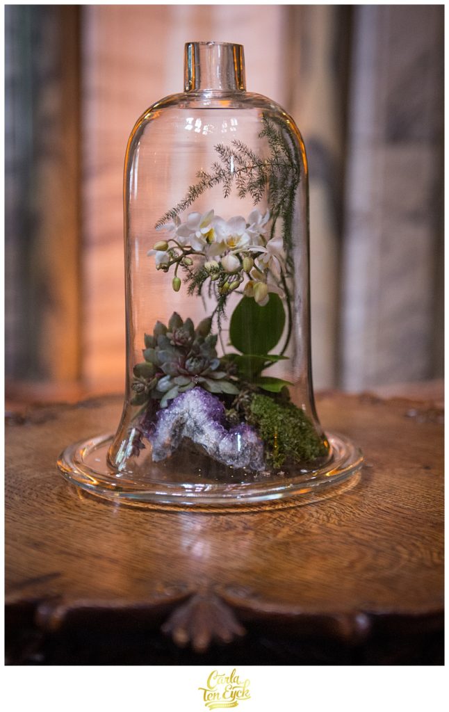 Bell jar with terrarium amethyst geode and white orchids