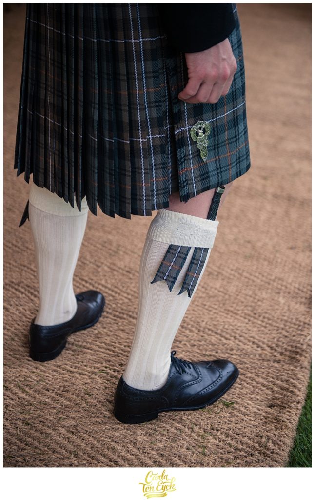 Scottish kilt detail at a wedding at Mount Stuart on the Isle of Bute Scotland 