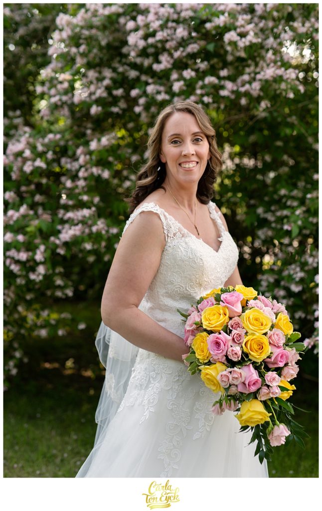 Bride smiles at her CT backyard wedding