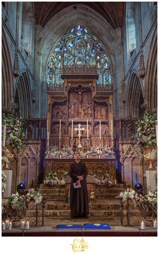 The vicar at Selby Abbey in Yorkshire UK before a wedding ceremony