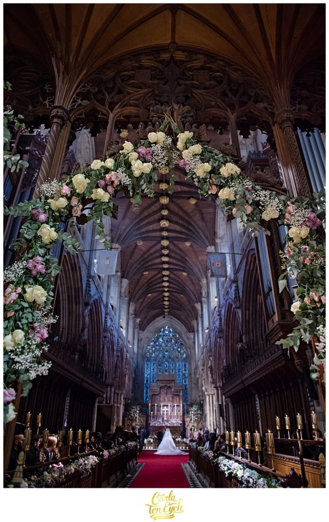 Floral arch at a wedding ceremony at Selby Abbey Yorkshire UK