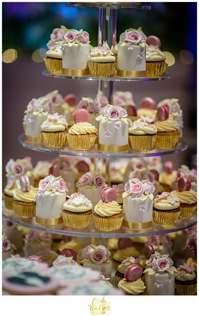 Cupcakes macaroons and sweets at a wedding at Selby Abbey in Yorkshire UK