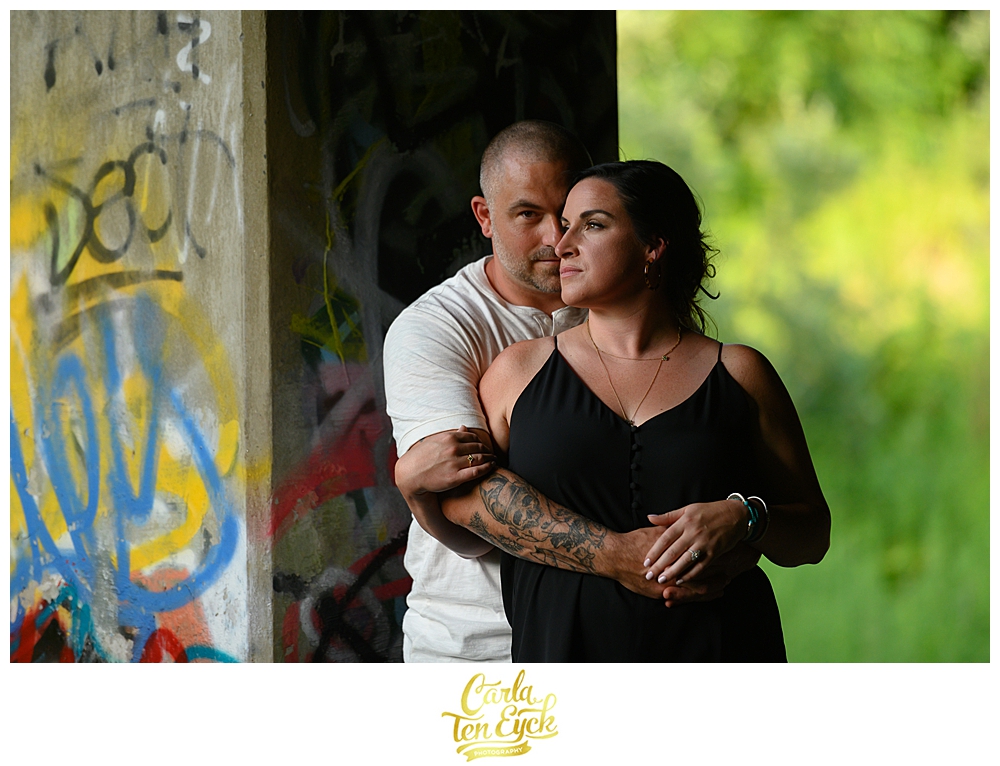 Couple snuggles at their CT engagement session in Portland CT