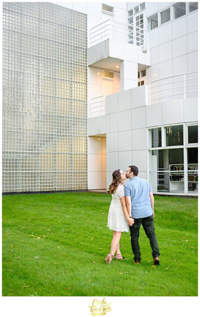 A couple kisses at their engagement session at The Hartford Seminary in Hartford CT