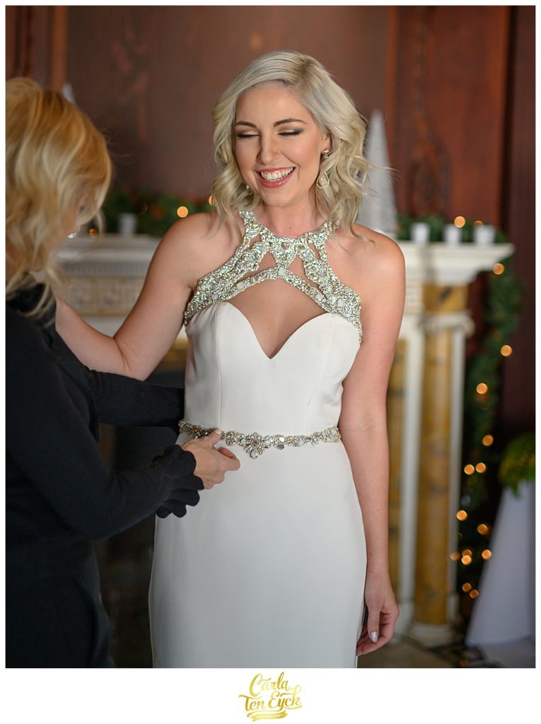 Bride laughs at her winter wedding in her Hayley Paige wedding gown at the Branford House, Groton CT