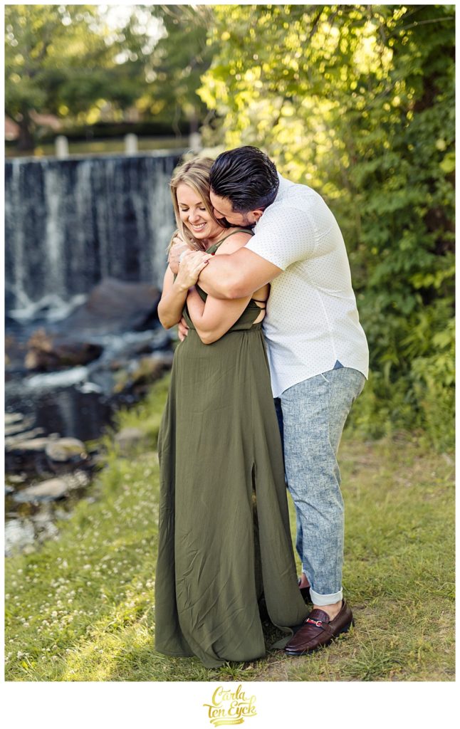 A couple cuddles during their Milford CT engagement session