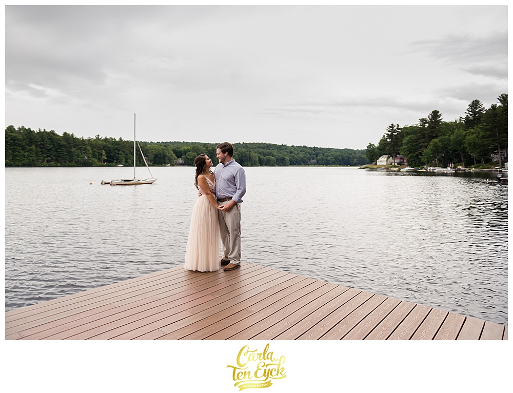 Bride and groom pose for their wedding photos on a dock during their micro wedding during covid 19