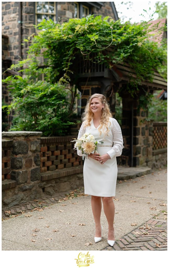 Bride poses for portraits during her intimate wedding in NY