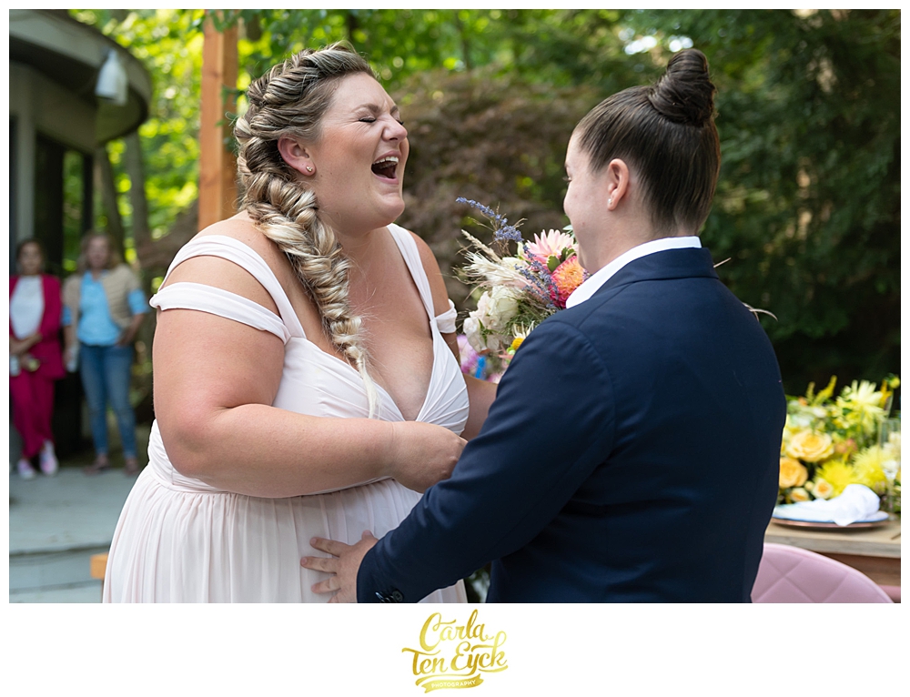 Two brides laugh at their LGBTQ wedding in Weston CT