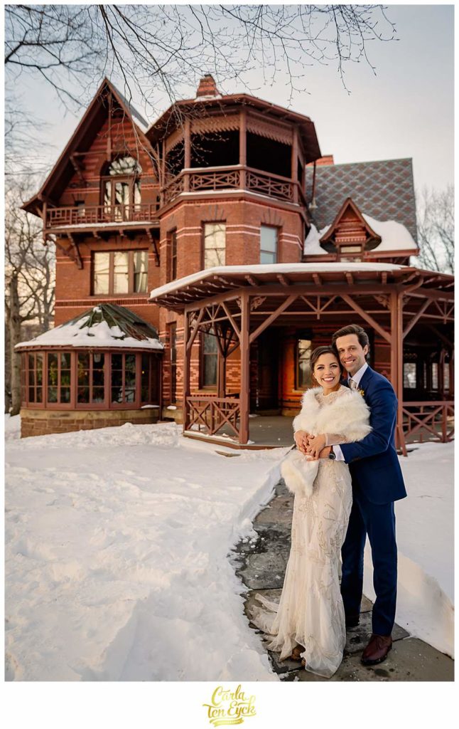 A couple embraces on their wedding day at The Mark Twain House in Hartford CT