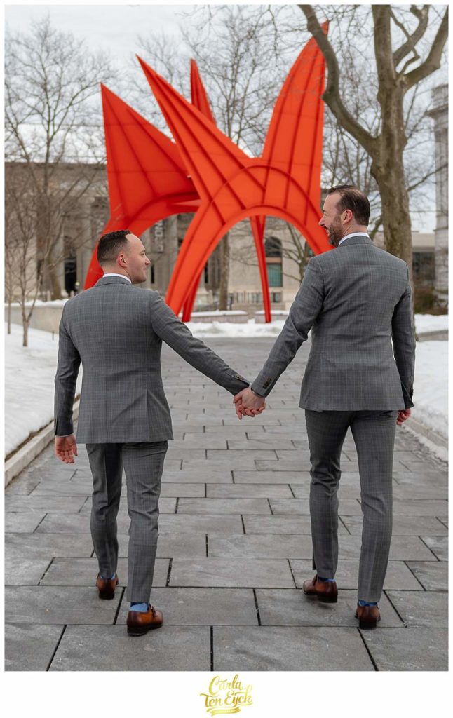 Two grooms walk to their elopement at Hartford City Hall, in Hartford CT