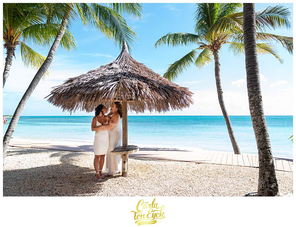 Two brides have their Aruba Wedding on the beach at the Tamarijn resort 