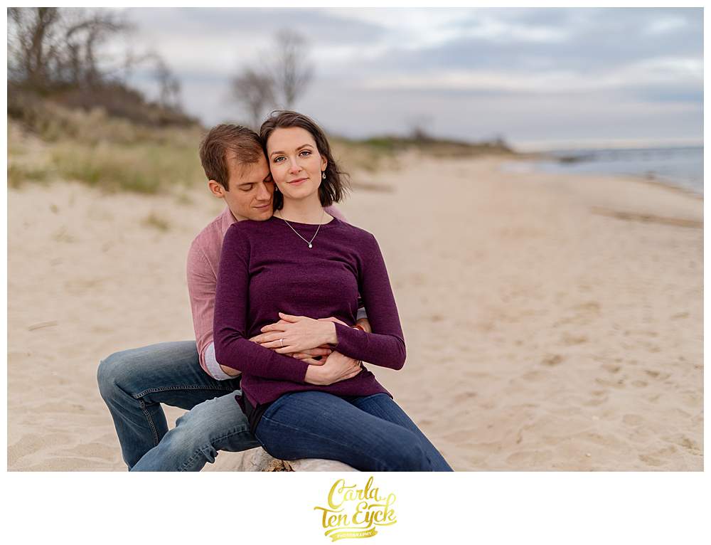 A couple during their spring Harkness Park engagement session on the beach in Waterford CT