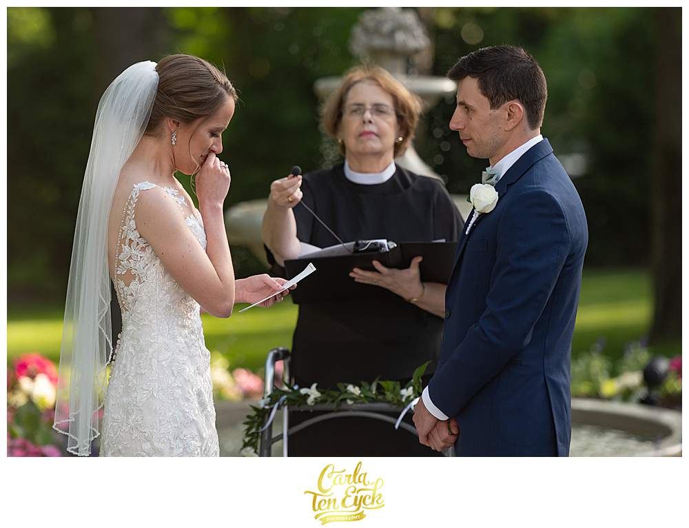 A bride gets emotional during her Fox Hill Inn Wedding in Brookfield CT