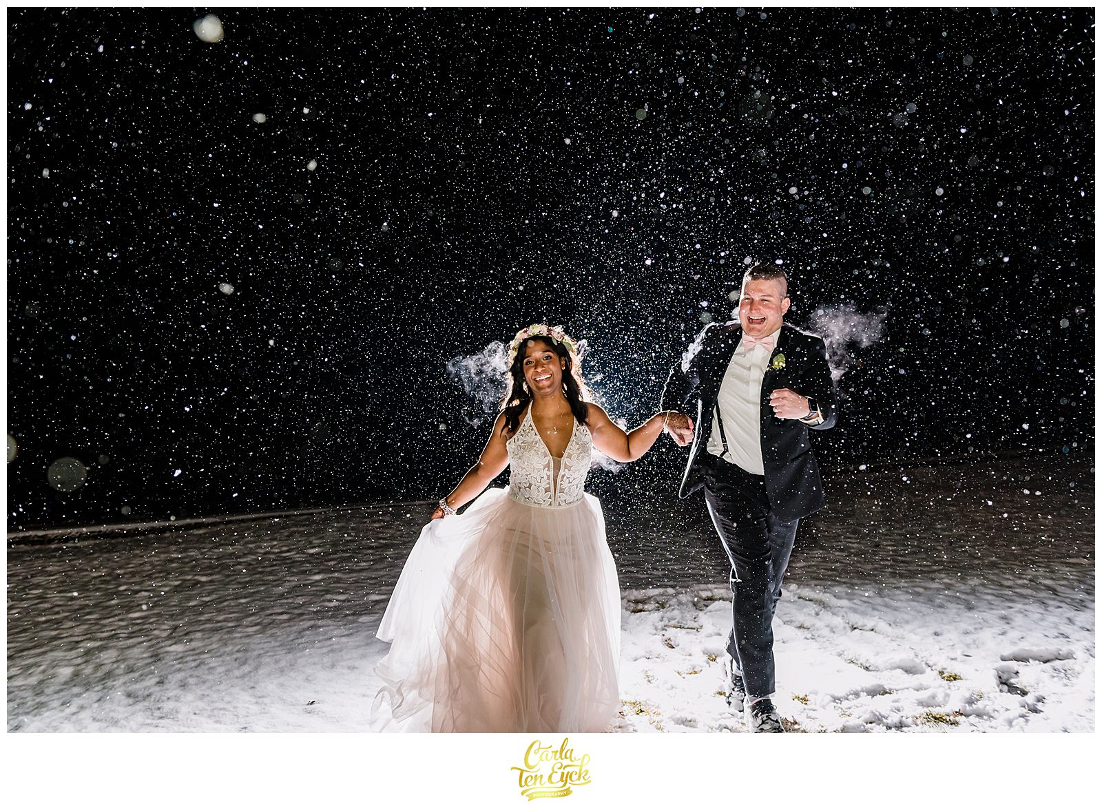 A bride and groom dance in the snow during their Pavillion at Crystal Lake wedding in Middletown CT