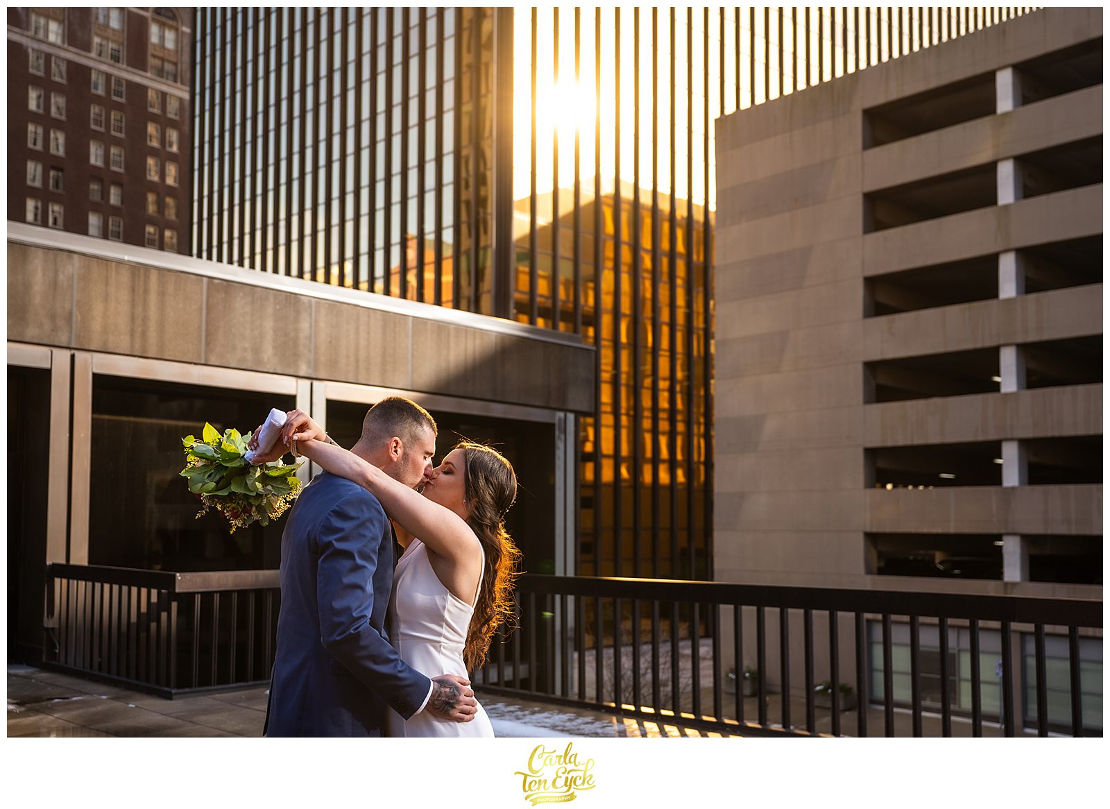 A bride and groom embrace during their spring Hartford elopement