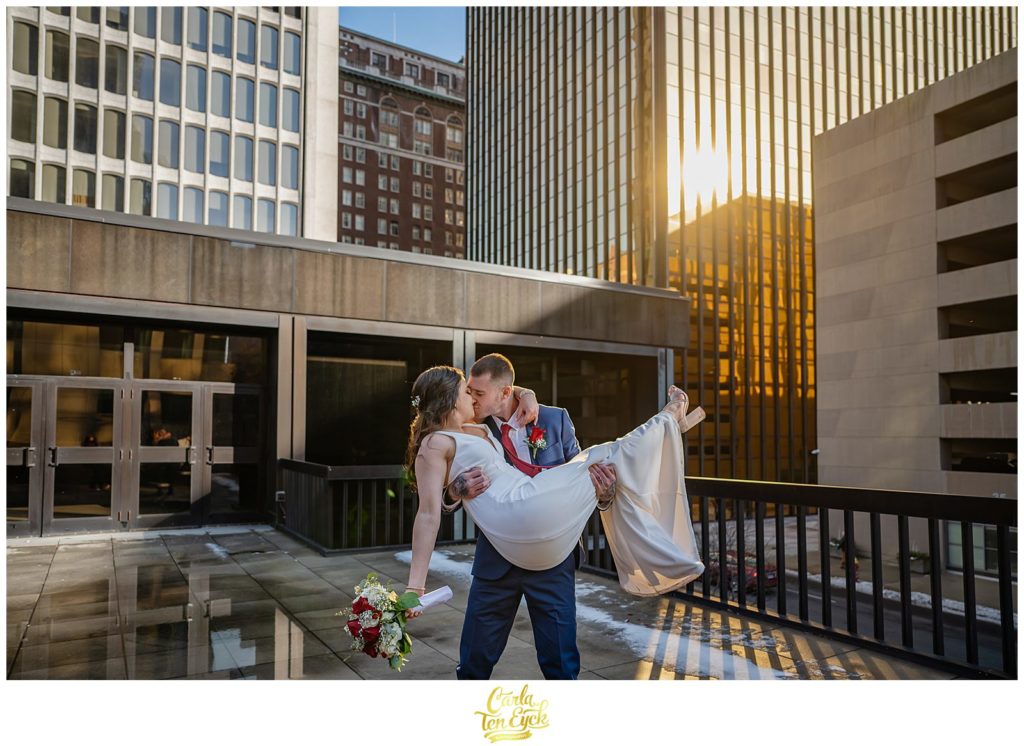 Just married! A couple celebrates after their Hartford City Hall Spring elopement, in Hartford CT