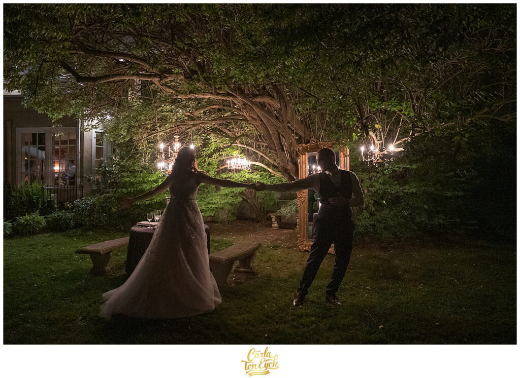 A bride and groom dance during their Lord Thompson Manor wedding