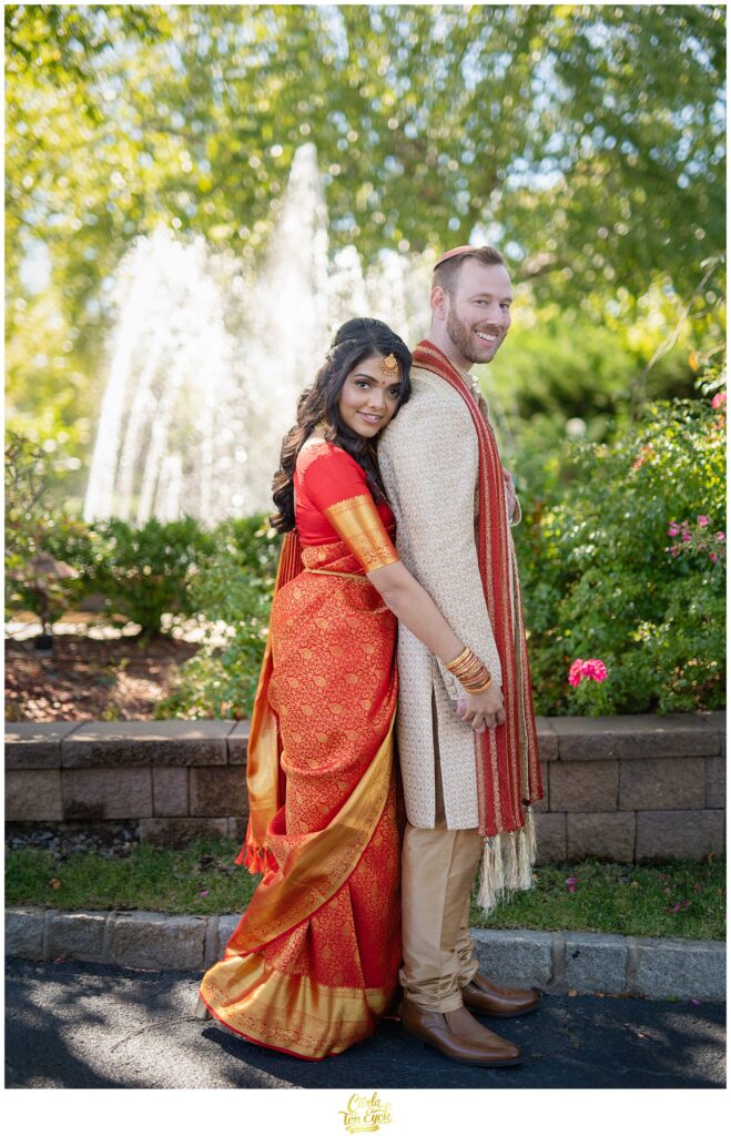 A Hindu bride and Jewish Groom pose for wedding photos at during their wedding at the VIP Country Club in New Rochelle NY