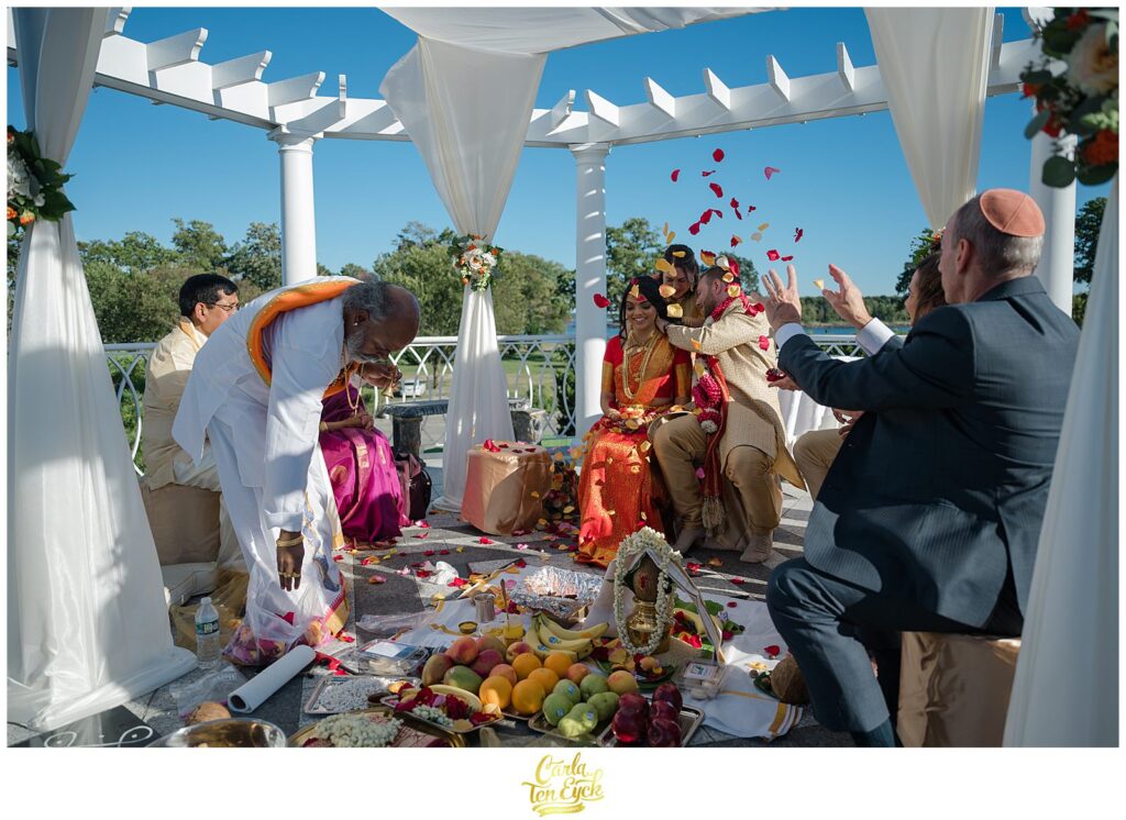 A Hindu wedding ceremony is performed during their wedding at the VIP Country Club in New Rochelle NY