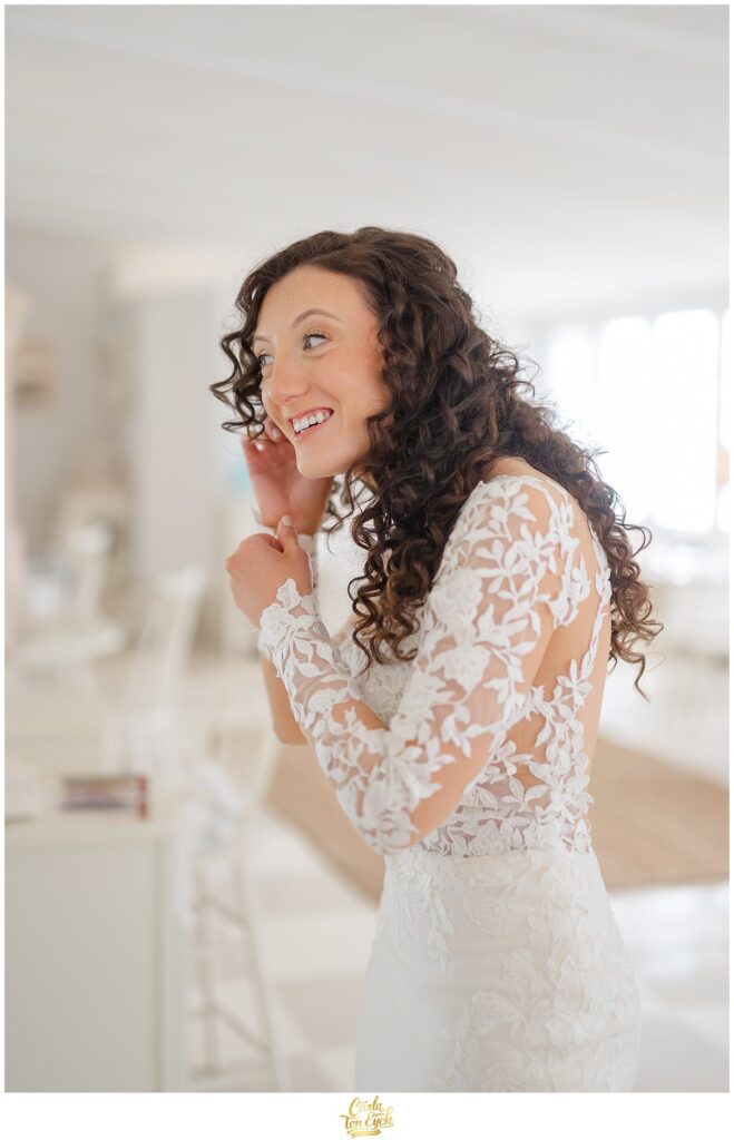 A bride gets ready at her romantic wedding at Lord Thompson Manor in Thompson CT