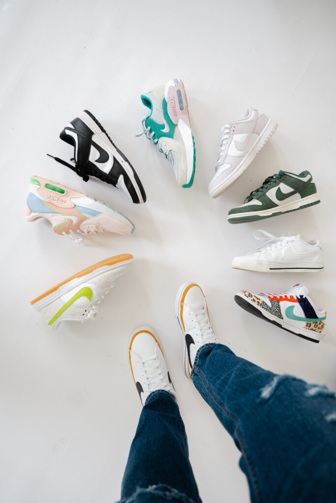 A pile of Nike Sneakers add a personal touch to your personal branding session