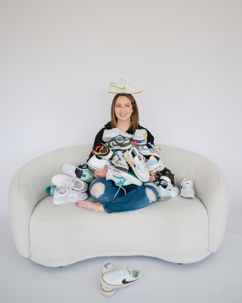 A branding expert is covered with her Nike sneakers during her colorful branding session