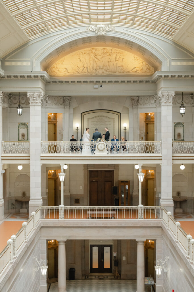 A couple hosts their elopement on the top floor of Hartford City Hall.