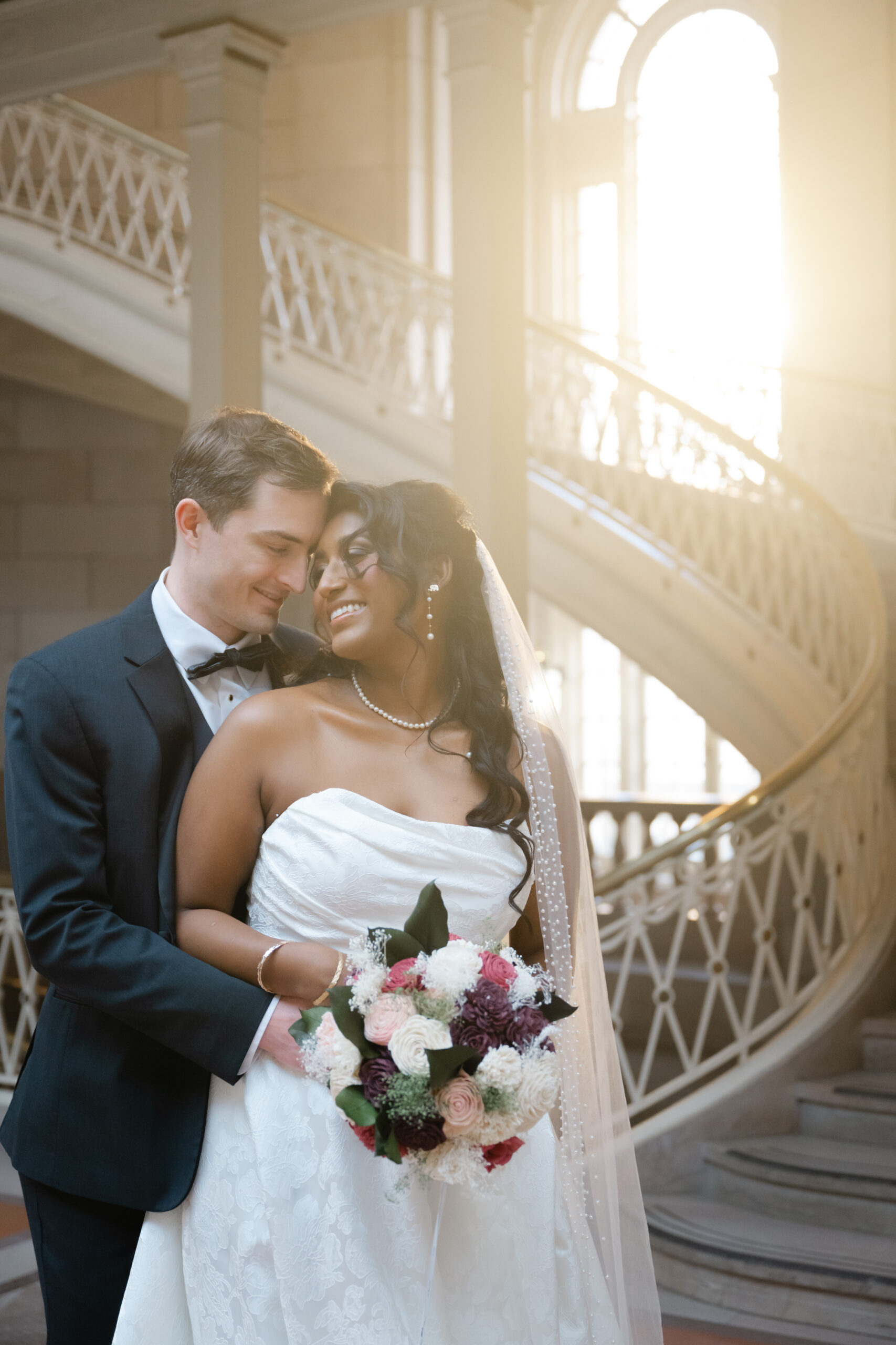 Hartford City Hall elopement by the iconic staircase with stunning afternoon light