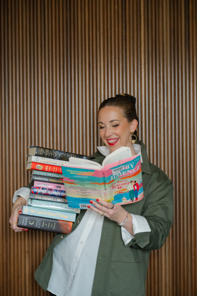 Adding books to your branding session to show your personality at the iconic TWA Hotel in NYC