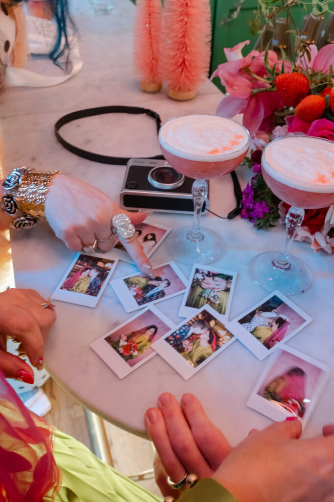 wedding polaroids and cocktails at a queer hartford city hall elopement at the Hartford Flavor Cocktail Parlour in Hartford CT