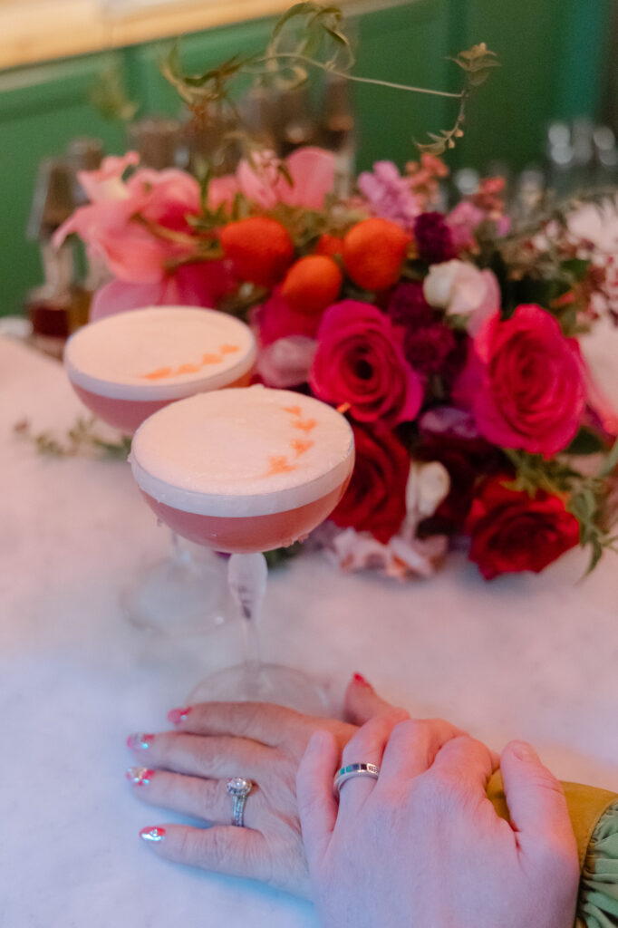Two brides with two cocktail at the Hartford Flavor Parlour on Pratt Street in Hartford