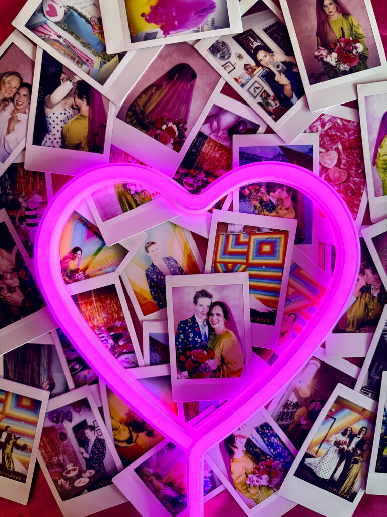 LGBTQ colorful Hartford City Hall elopement polaroids instax wedding details neon signs